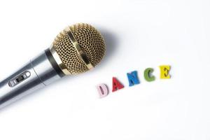 Microphone on a white background with the word dance. photo