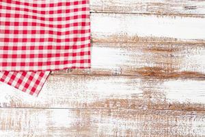 vintage tablecloth on old wooden table, holiday concept,mock up photo
