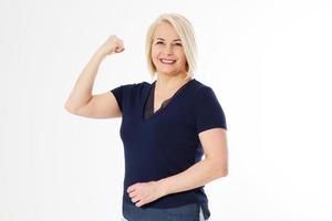 Woman show gesture power, middle age woman show muscle isolated copy space, feminity power concept, modern female photo