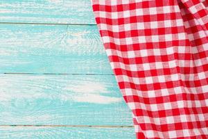 cloth red napkin on blue wooden background, mock up,copy space photo