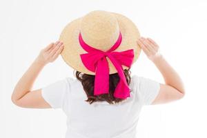 Closeup of woman in summer beach hat back view isolated on white background. Template t shirt rear view. Vacation and fun holidays concept. Copy space photo