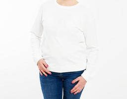 White pullover on a young woman in shorts closeup, isolated, with copy space, mockup. photo