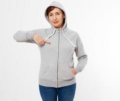 pointed asian woman in gray pullover hoodie mockup photo