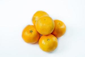 Copy space and mock up. Mandarin, tangerine citrus fruit isolated on white background.