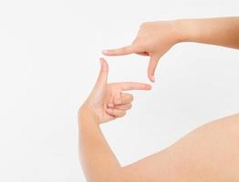 Female hands framing comosition. Isolated on white background. Copy space. Mock up. photo