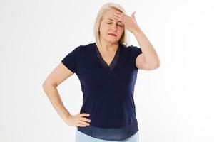 Middle age woman head pain migraine, A middle-aged woman stands and touches her head with her hand - she has a temperature or head ache, health care concept photo