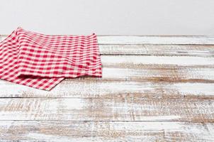 Kitchen cloth on wood table with copy space - Vintage Filter, copy space photo