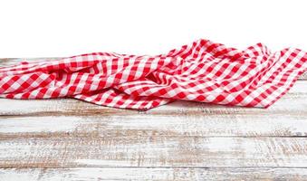 chekered tablecloth on empty table isolated on white background copy space photo