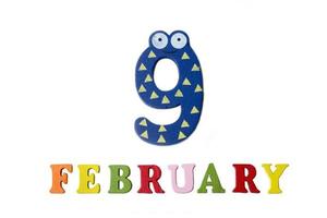February 9 on white background, numbers and letters. photo