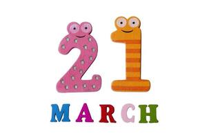 March 21 on white background, numbers and letters. photo