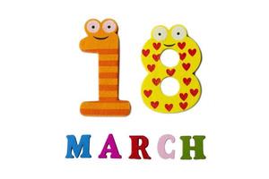 March 18 on white background, numbers and letters. photo