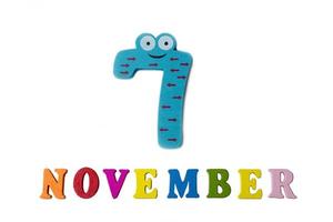 November 7 on white background, numbers and letters. photo
