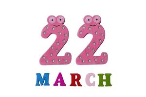 March 22 on white background, numbers and letters. photo