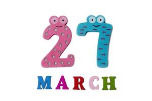 March 27 on white background, numbers and letters. photo