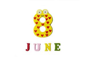 The figure eight and the word June on a white background. photo