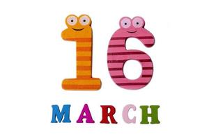 March 16 on white background, numbers and letters. photo