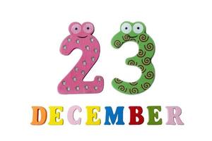 December 23 on white background, numbers and letters. photo