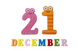 December 21 on white background, numbers and letters.