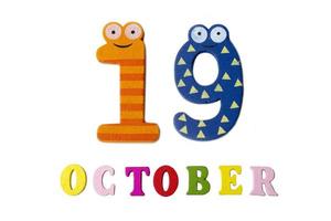 October 19 on white background, numbers and letters. photo