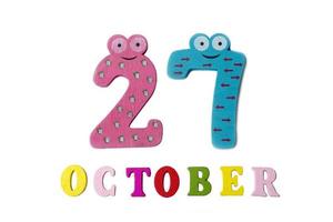 October 27 on white background, numbers and letters. photo