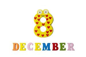 December 8 on white background, numbers and letters. photo