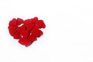 Red hearts on a white background. photo