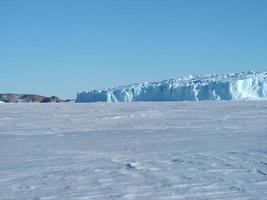 Antarctica endless ice fields icebergs in the sea photo