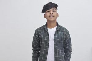 Handsome Indian young boy wearing white t-shirt. photo