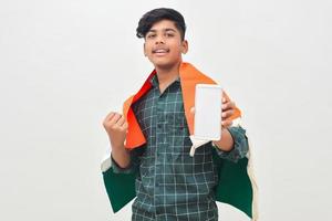 Young indian man celebrating indian republic day or independence day photo