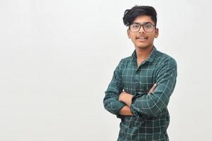 Young indian man with his arms crossed. photo