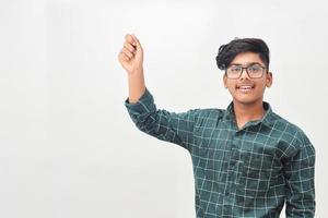 Young indian man holding indian flag in hand. photo