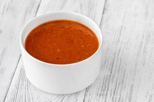 Bowl of tomato cream soup photo