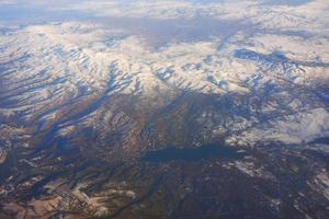 View to the snowy mountains. Travel and transportation concept photo