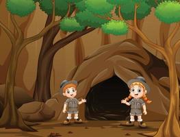 Scout boy and girl talking near the cave vector