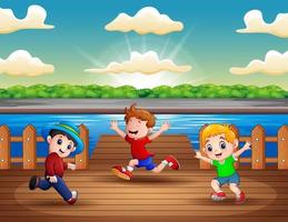 ilustración de tres niños corriendo en el puerto vector