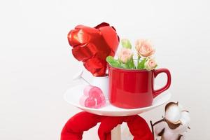 Mock up red cup for text or pattern for Valentines Day decoration photo