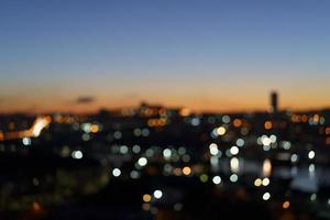 Landscape with blurred lights of the night city. photo