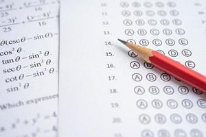 Answer sheets with pencil drawing fill to select choice, education concept photo