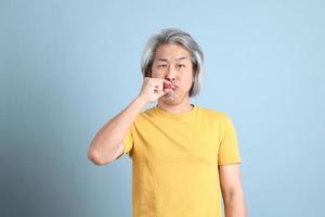 Asian Man with Yellow Tshirt photo