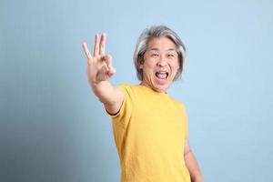 Asian Man with Yellow Tshirt photo