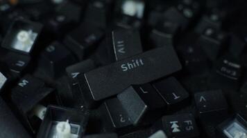 A pile of loose keyboard keys. photo