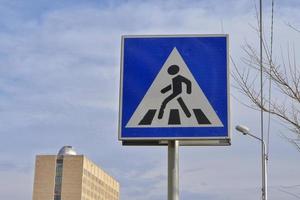 Zebra crossing road sign in the street. photo