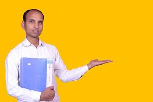 Indian student Standing with file Pictures, Images and Stock Photos