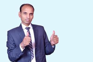 Indian Businessman Standing with thumbs up Pictures, Images and Stock Photos