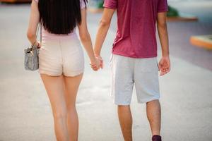 young woman and man couple person having fun and enjoy dating lifestyle at amusement theme park photo