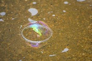 Water bubble falling on the ground