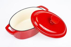 Red ceramic cast iron casserole dish. Studio Photo