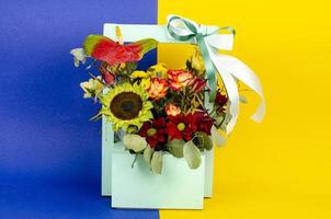 Luxurious beautiful bouquet of fresh flowers on bright background. Studio Photo