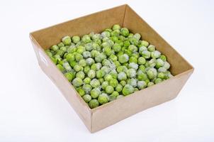 Frozen green peas, preservation of vitamins and vegetables. Studio Photo