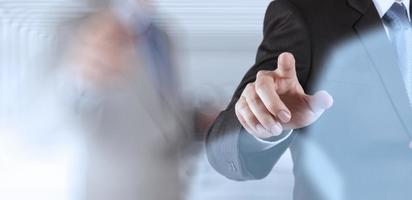 businessman success working computer touch screen with his team as concept photo